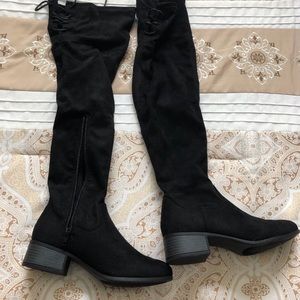 Black, suede, over-the-knee boots. Back has laces